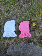 knitted balaclavas on the grass